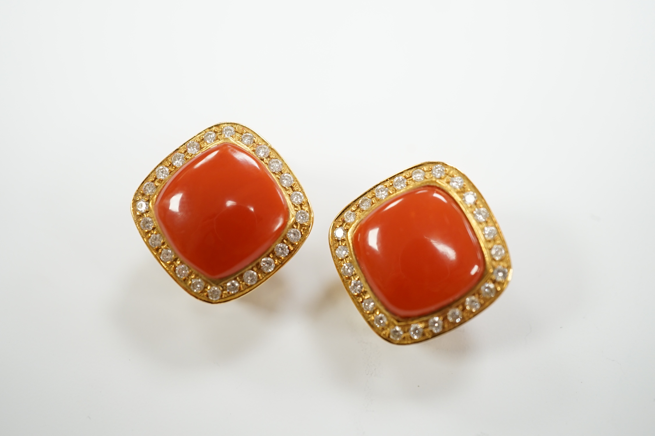 A pair of Italian 750 yellow metal, coral and diamond cluster set ear clips, 17mm, gross weight 15.6 grams.